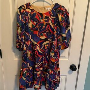 TCEC size small women’s dress. Bold gorgeous colors. Great condition